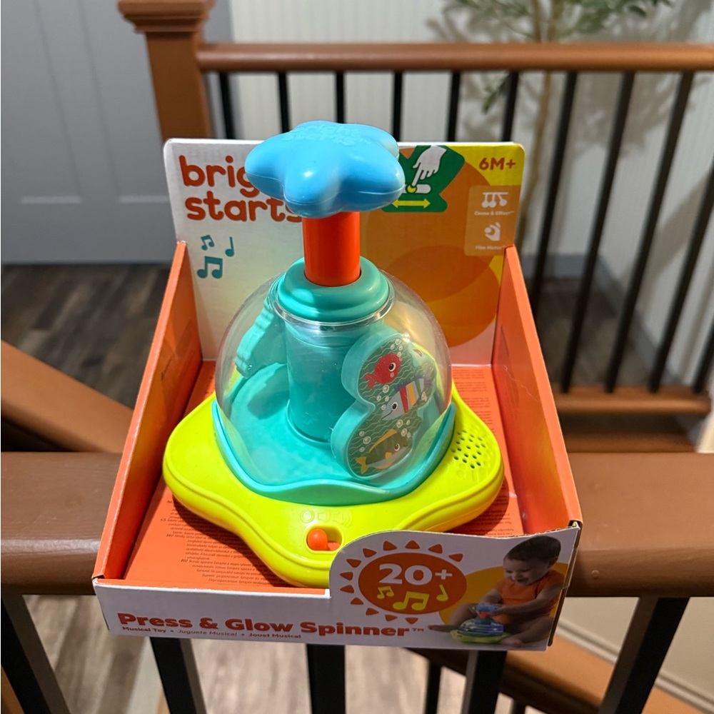 Bright Starts Press & Glow Spinner Toy
